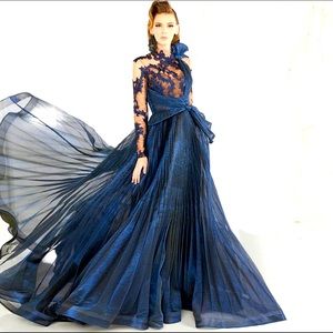 Dress worn only once for about an hour for a Photoshoot. In excellent condition